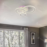 Żyrandol LED z pilotem i kryształem LEOCADIA RGB 134W, 3 koła, światło zimne/ciepłe/neutralne, możliwość przyciemniania, żyrandol LED z białego kryształu Domyślny tytuł Alessandro Design