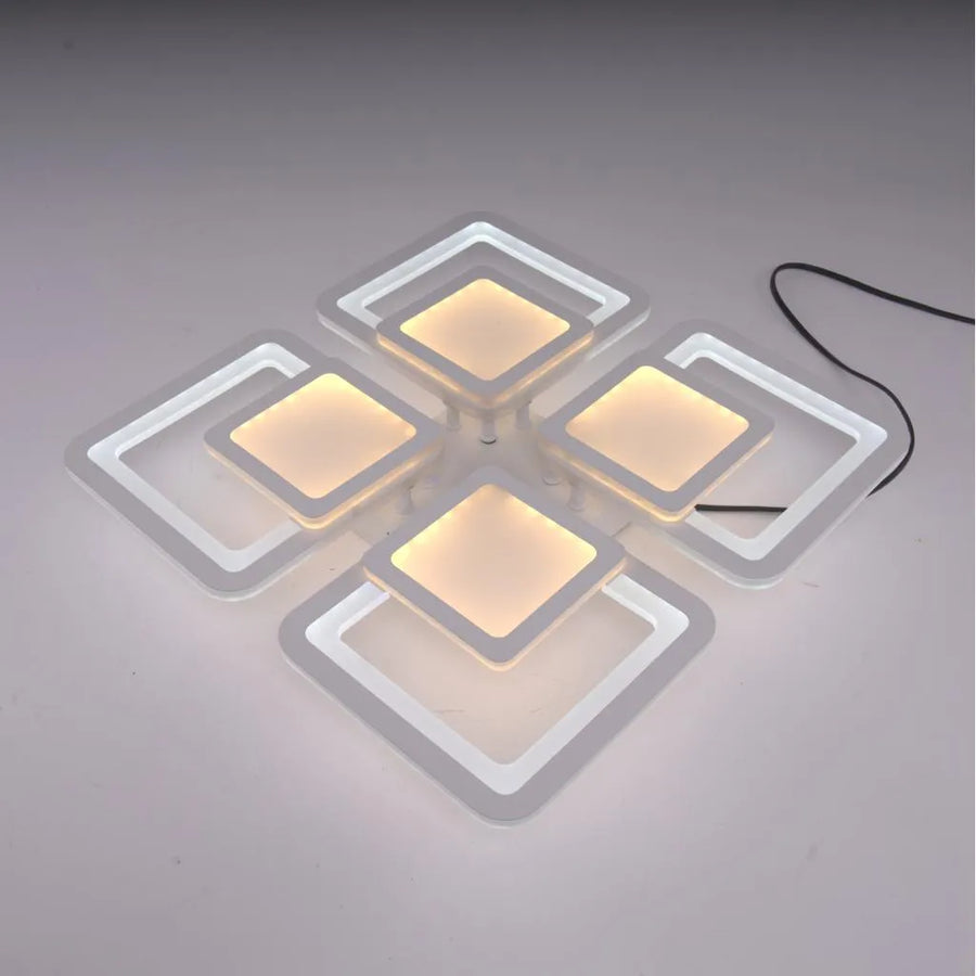 Żyrandol LED z pilotem SUSAN 96W, 4 kwadraty, światło zimne/ciepłe/neutralne, możliwość przyciemniania, biały Żyrandol LED z pilotem Domyślny tytuł Alessandro Design